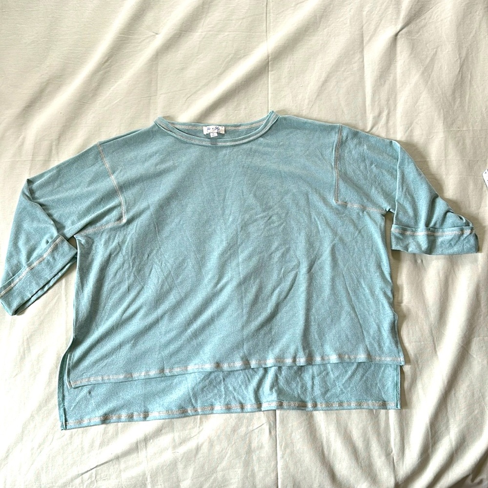Light sea foam colored sweater with cuffed sleeves